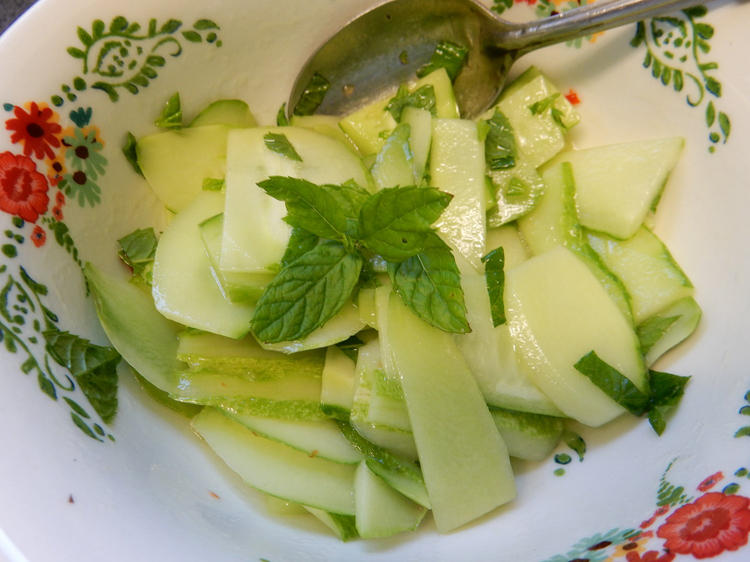 A kirby cucumber salad with fresh mint.